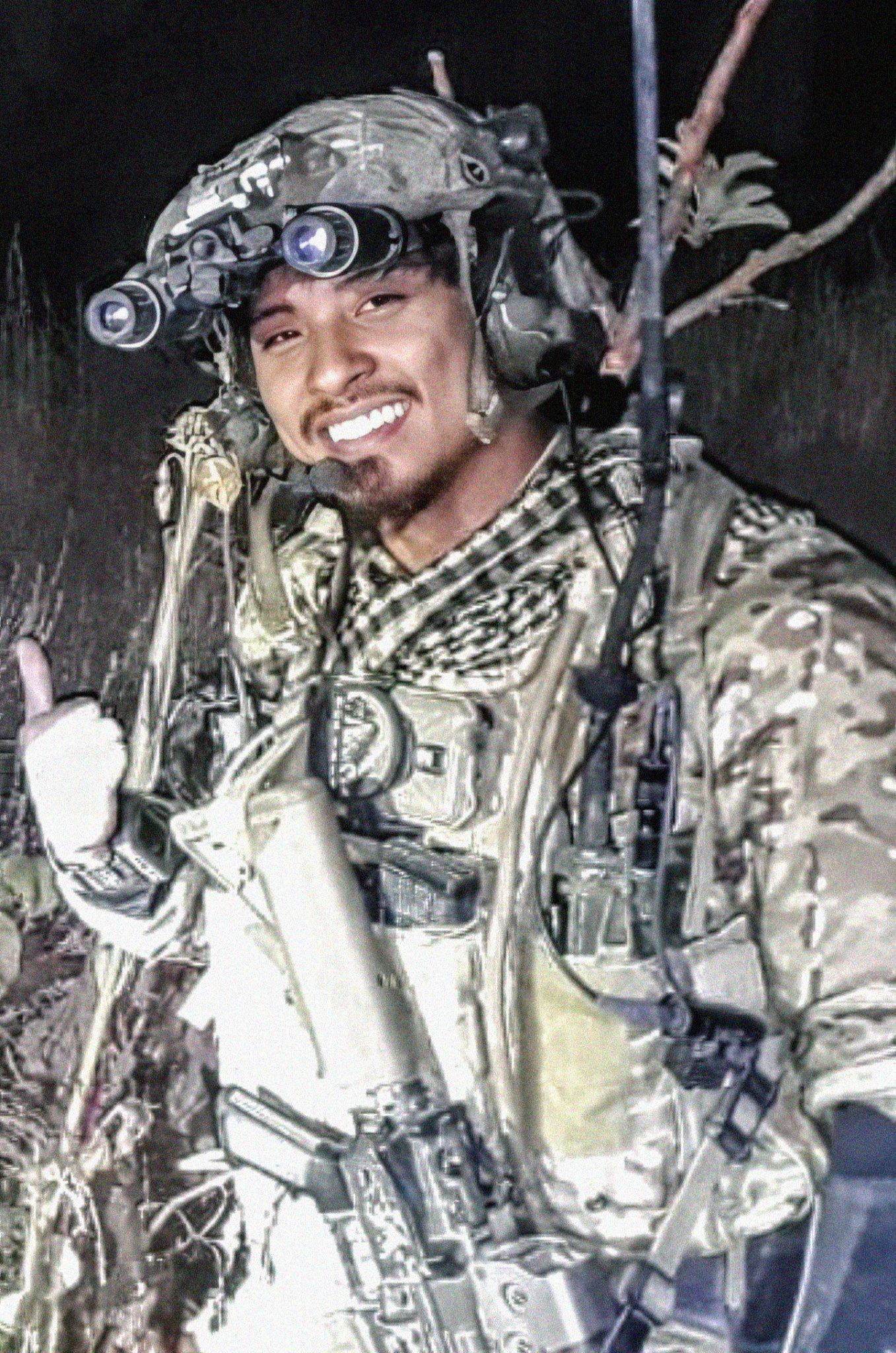 Jonathan Lu in military field uniform and helmet